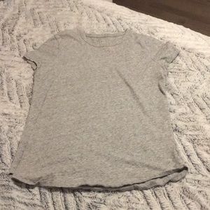 Grey short sleeve GAP tee shirt.